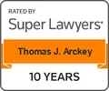 Professional badge displaying "Rated by Super Lawyers," featuring the name Thomas J. Arckey and "10 Years" text.